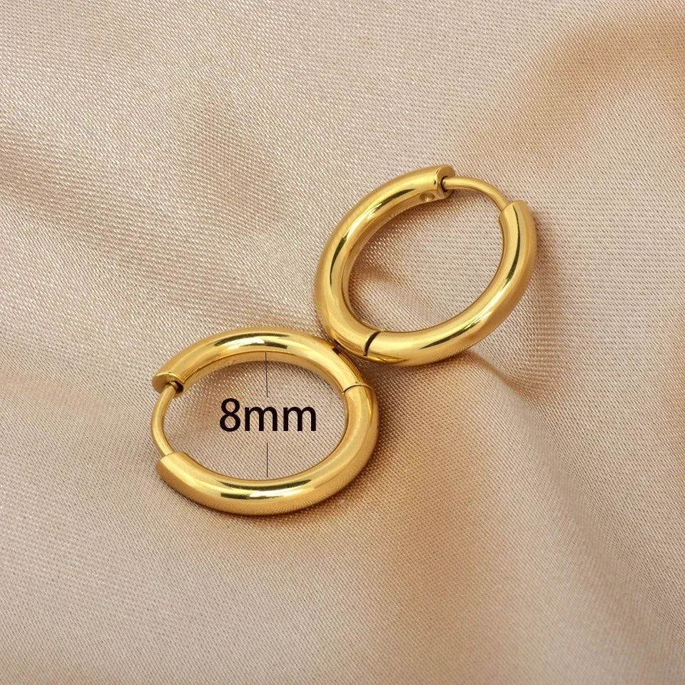 Petites boucles d'oreilles créole avec pendentif