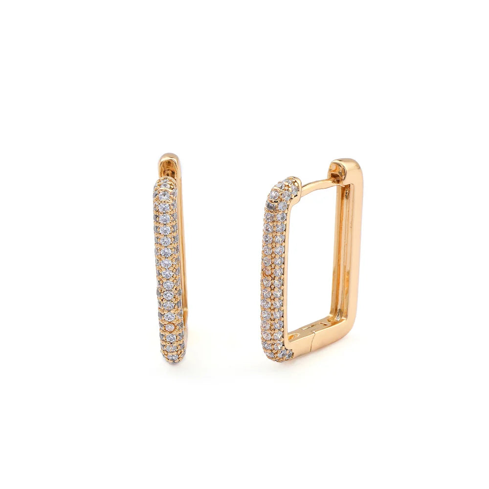 boucle d'oreille créole or rose avec diamant