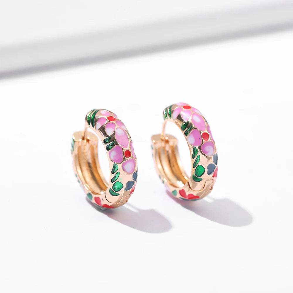 boucles d'oreilles créoles vintage avec motif à fleur
