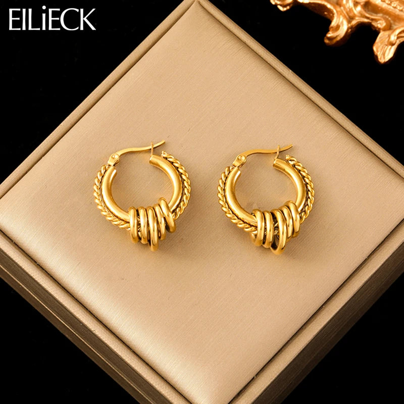 Boucle d'oreille créole torsadée plaqué or
