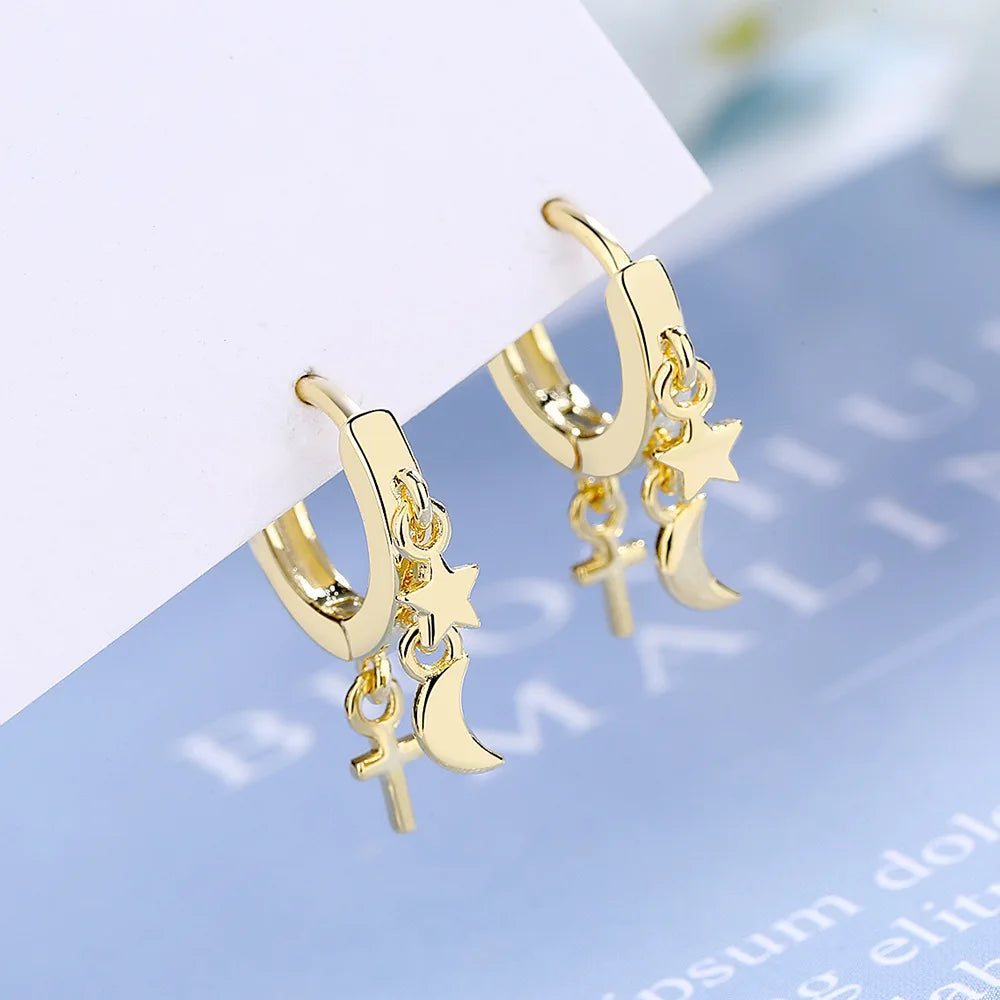 Boucles d'oreilles créoles en forme d'étoile