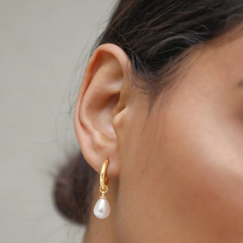 boucles d'oreilles créoles avec perles