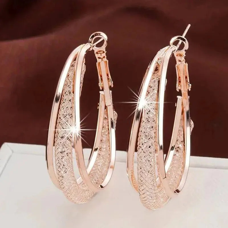 Boucles d'oreilles créoles en pierre de cristal