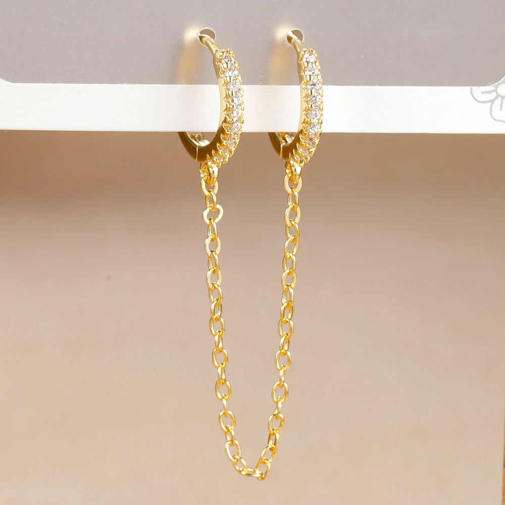 Boucle d'oreille créole avec chaîne et étoile