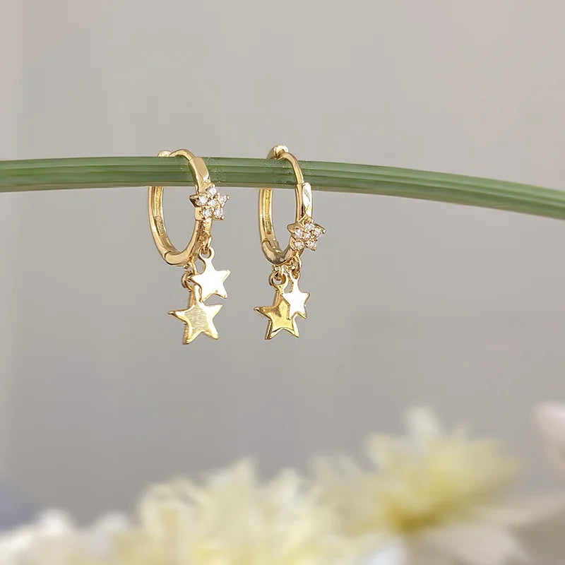 Boucles d'oreilles créoles en forme d'étoile