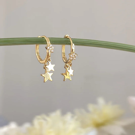 Boucles d'oreilles créoles en forme d'étoile