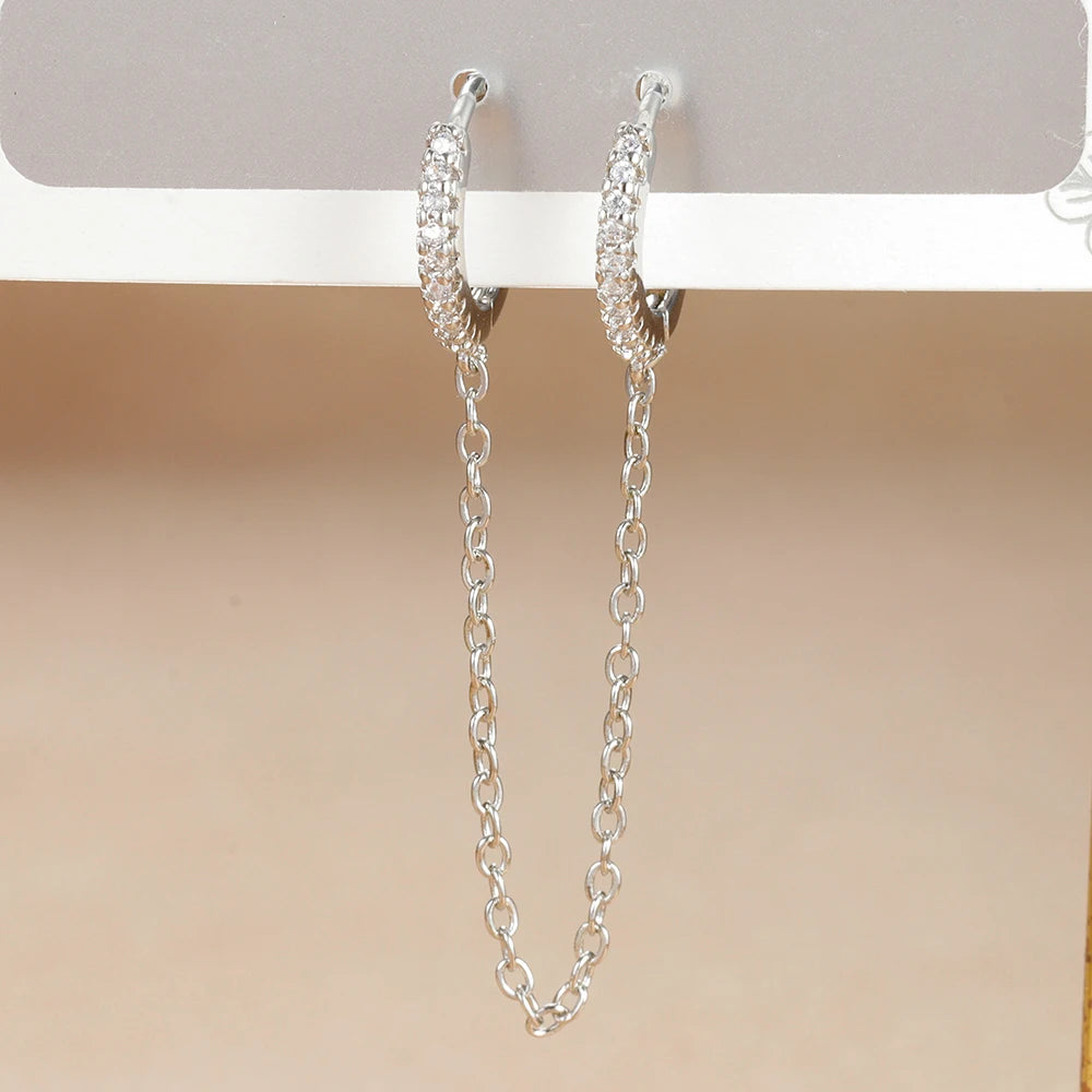 Boucle d'oreille créole avec chaîne et étoile