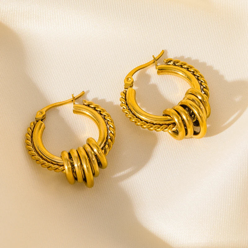 Boucle d'oreille créole torsadée plaqué or