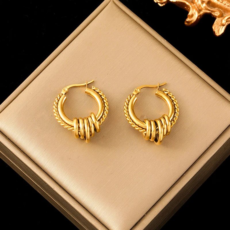 Boucle d'oreille créole torsadée plaqué or