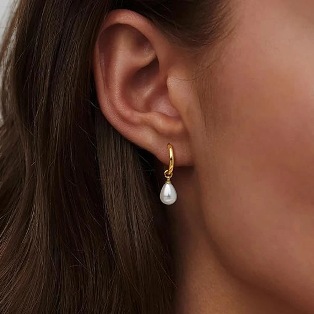 boucles d'oreilles créoles avec perles