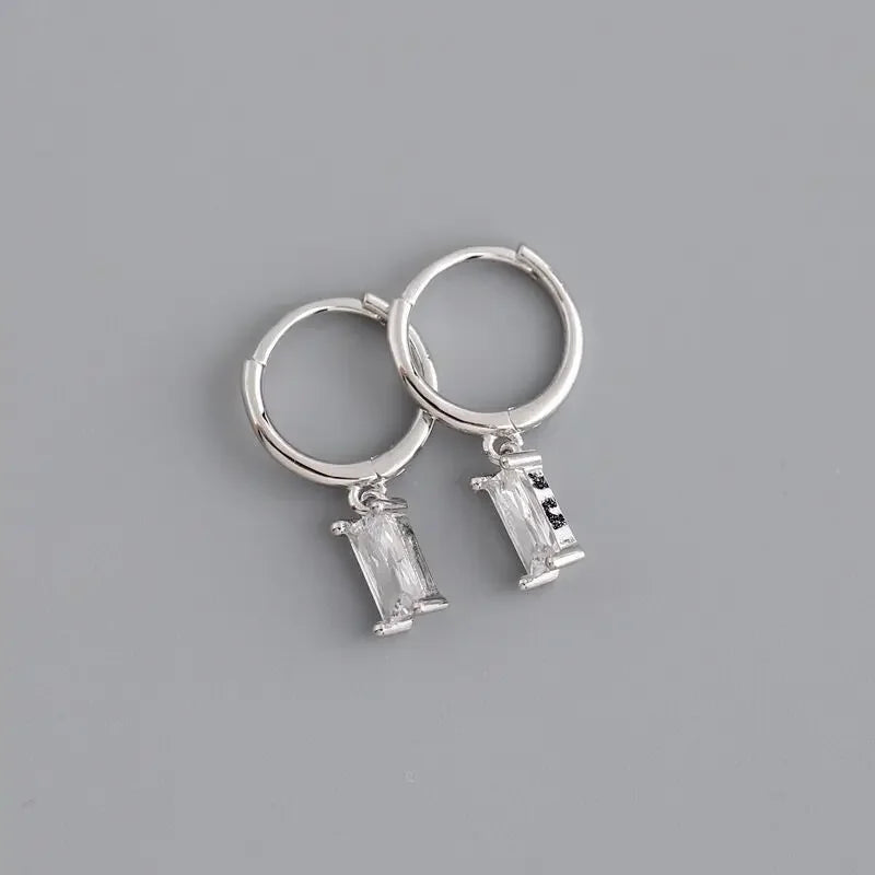 Petites boucles d'oreilles créole avec pendentif