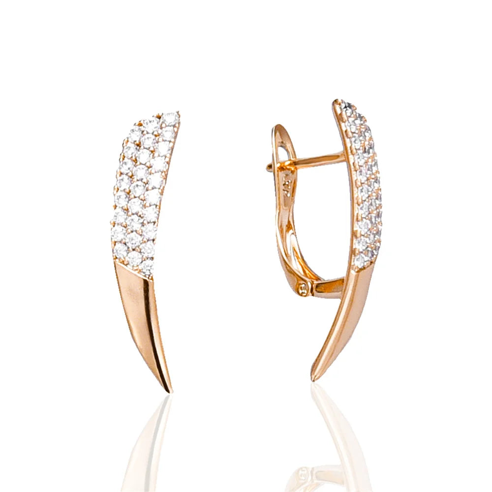 boucle d'oreille créole or rose avec diamant