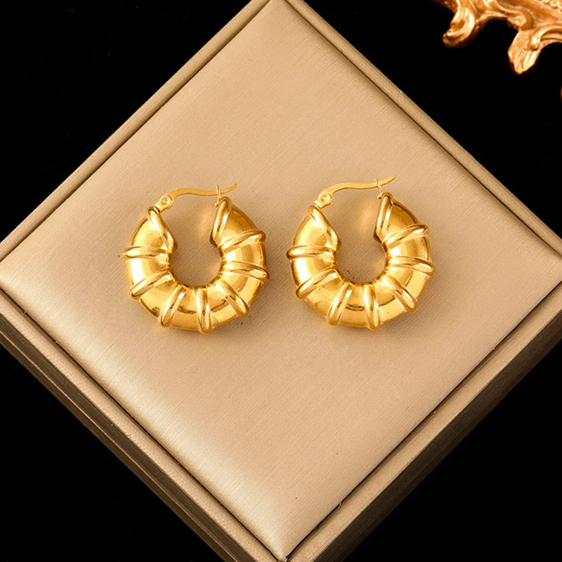Boucle d'oreille créole torsadée plaqué or