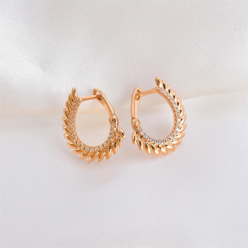 boucle d'oreille créole or rose avec diamant