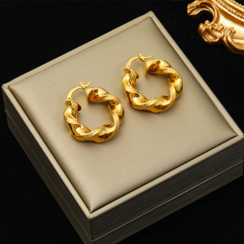 Boucle d'oreille créole torsadée plaqué or