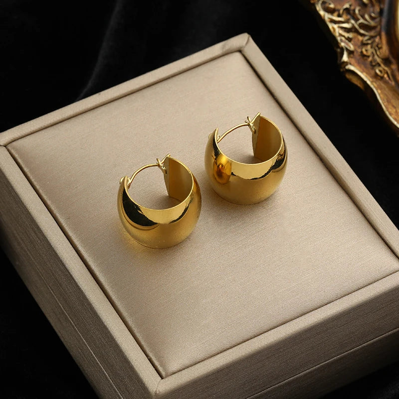 Boucle d'oreille créole torsadée plaqué or