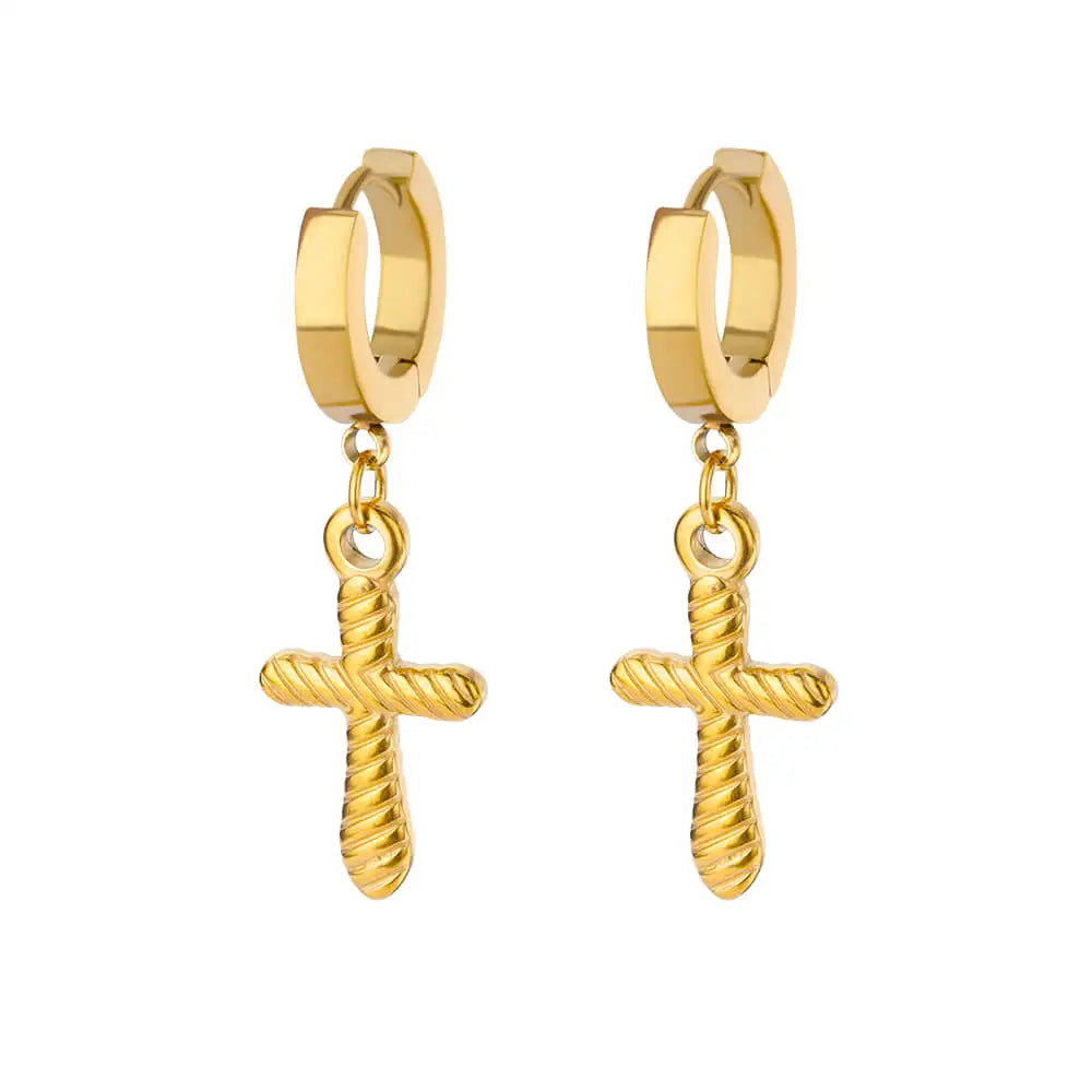 boucle d'oreille créole avec une croix significative