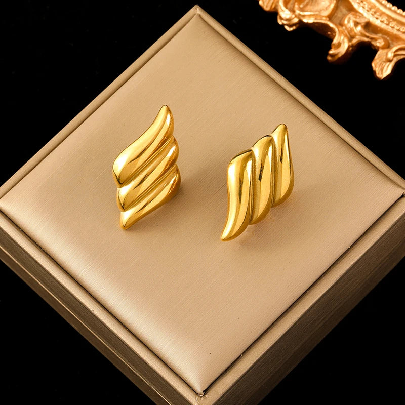 Boucle d'oreille créole torsadée plaqué or