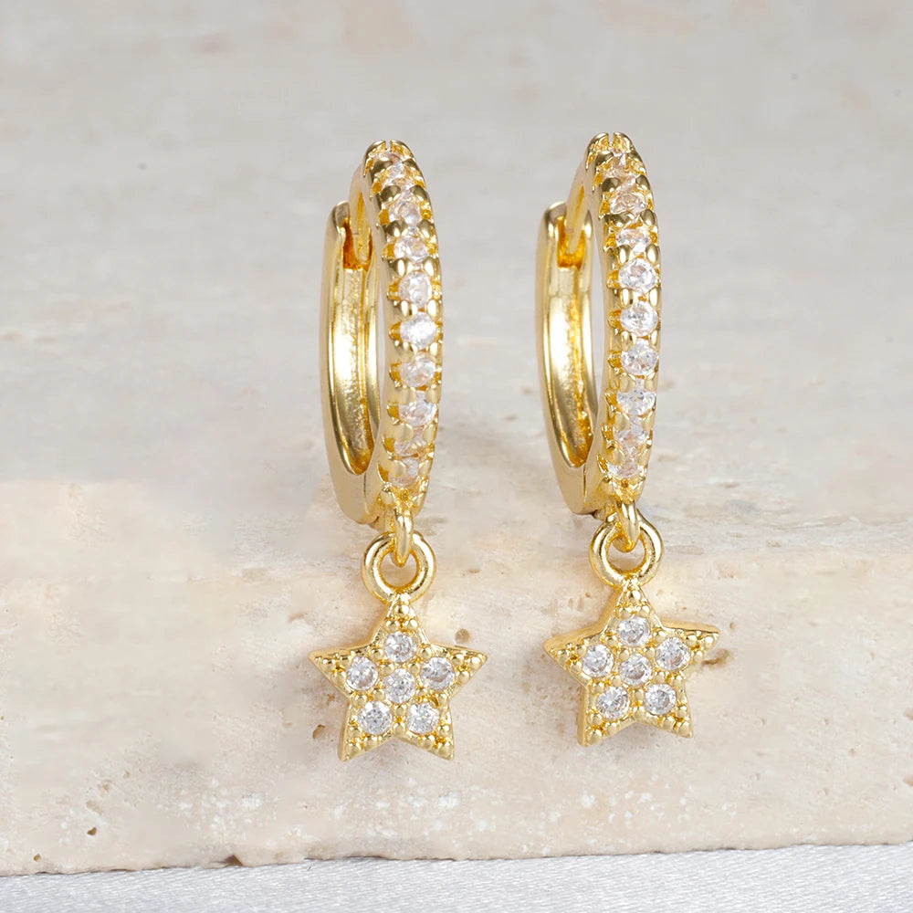 Boucle d'oreille créole avec chaîne et étoile