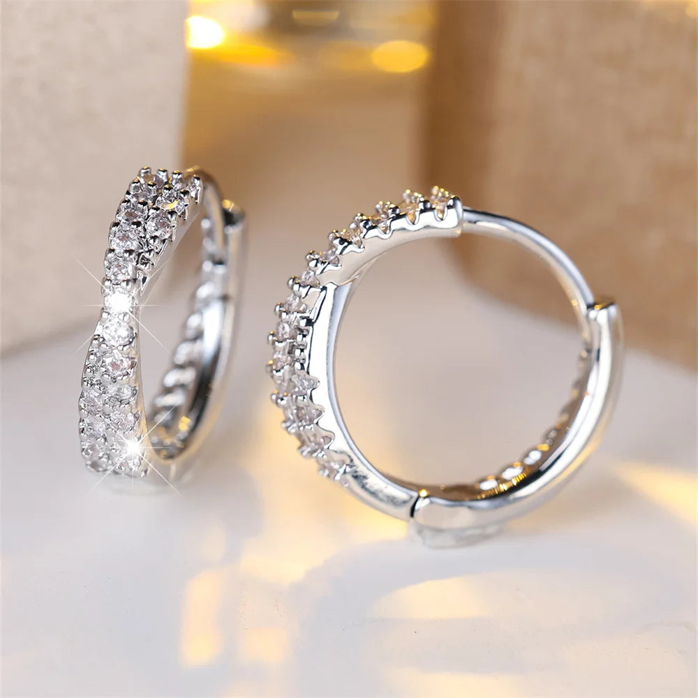 Boucles d'oreilles créoles croisées