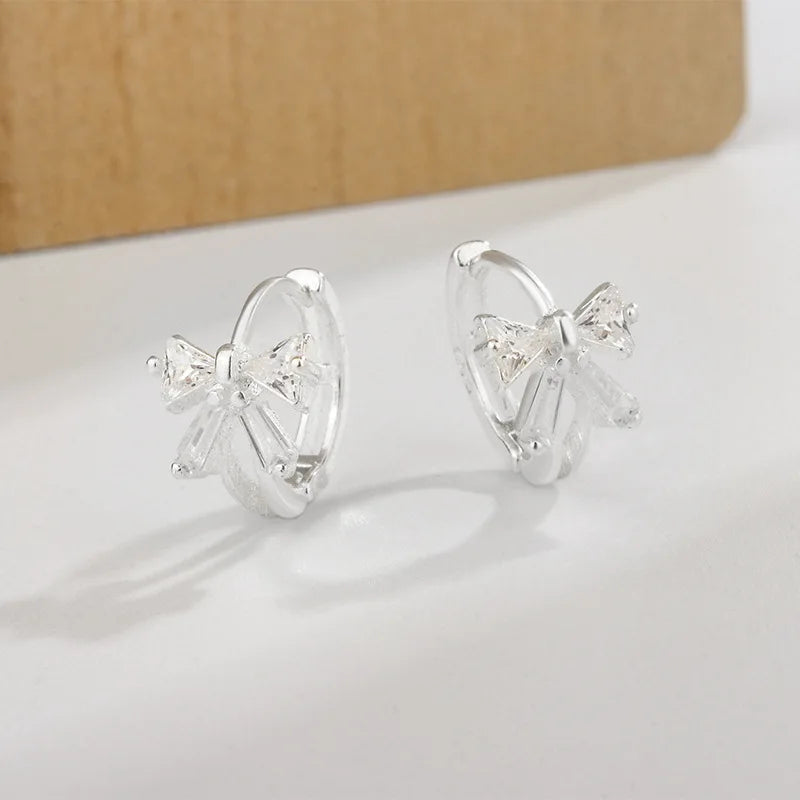 Petites boucles d'oreilles créole avec pendentif