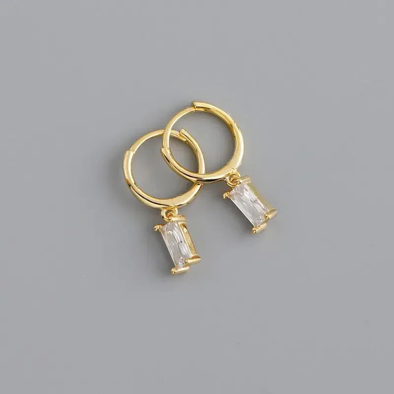 Petites boucles d'oreilles créole avec pendentif