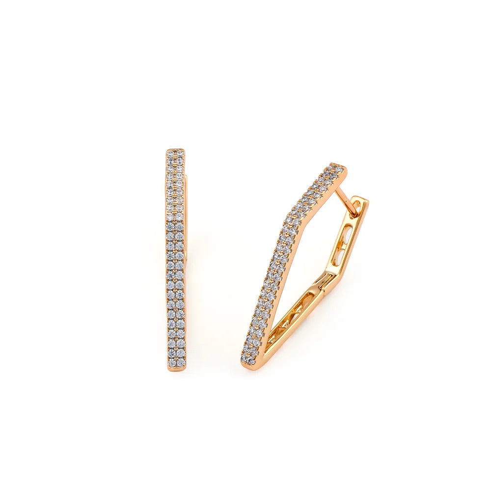 boucle d'oreille créole or rose avec diamant