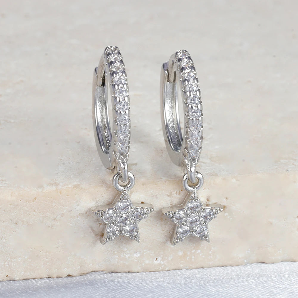 Boucle d'oreille créole avec chaîne et étoile