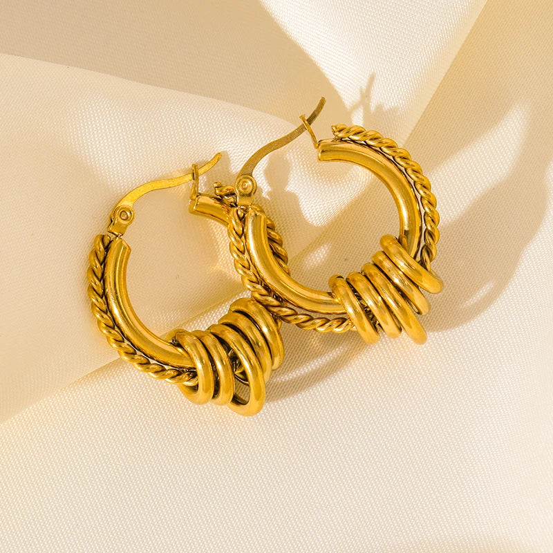 Boucle d'oreille créole torsadée plaqué or