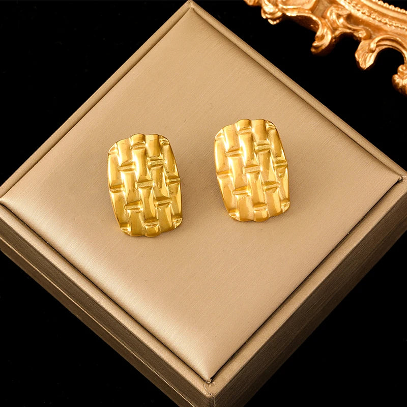 Boucle d'oreille créole torsadée plaqué or