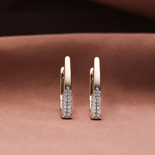 boucle d'oreille créole or rose avec diamant