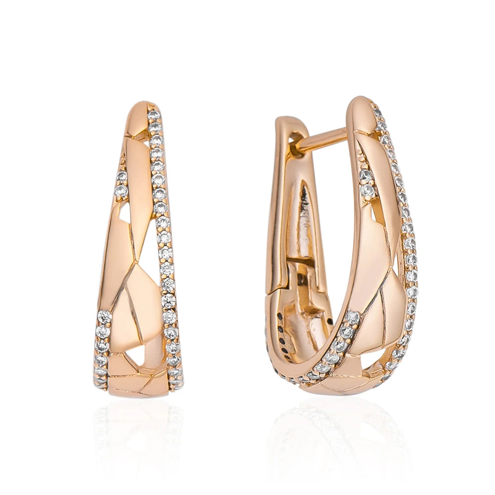 boucle d'oreille créole or rose avec diamant