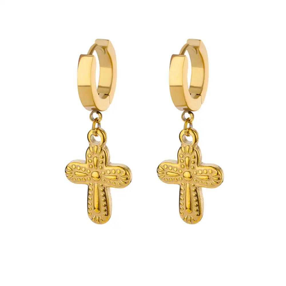boucle d'oreille créole avec une croix significative