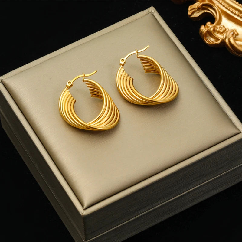 Boucle d'oreille créole torsadée plaqué or
