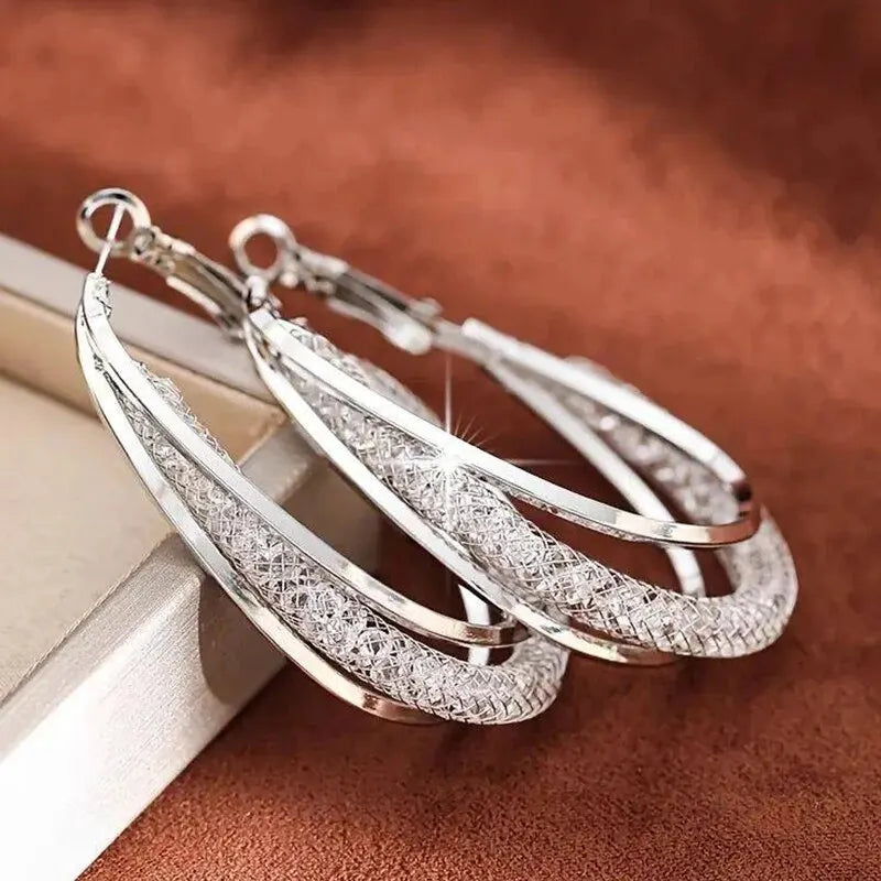 Boucles d'oreilles créoles en pierre de cristal