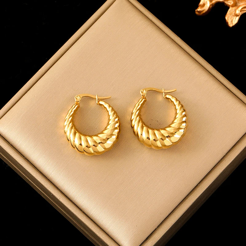 Boucle d'oreille créole torsadée plaqué or