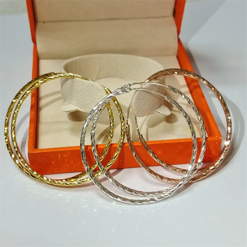 Grande boucles d'oreilles créoles plaqué or